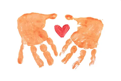 Two orange child handprints with a heart